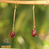 Statement red and gold earrings with bead drops for women