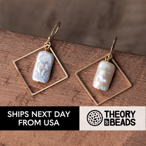 Artisan handmade and handcut white and golden freshwater pearl dangle earrings for her by Theory of Beads