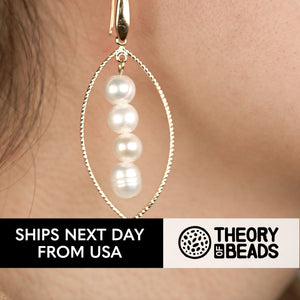 White and gold freshwater pearl earrings with hook clasps by Theory of Beads